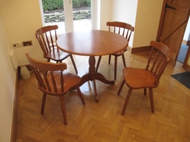 4 country style solid pine spindle back chairs and table 