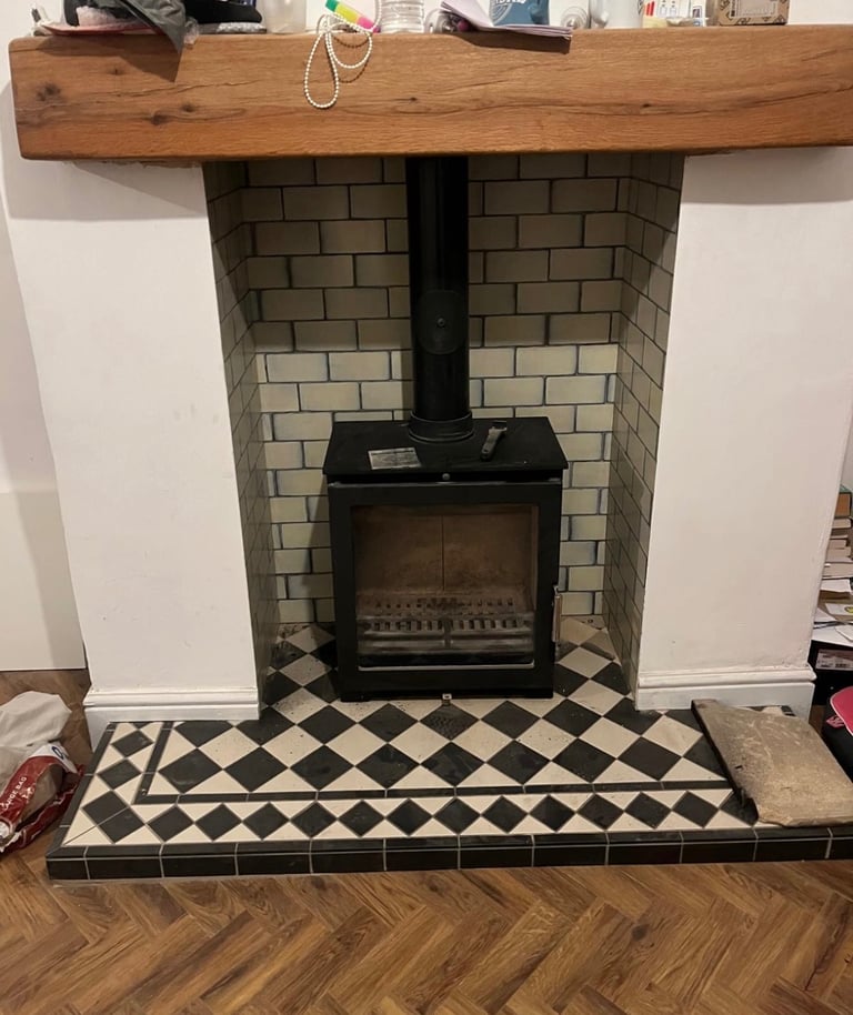 Log Burner and Wooden Beam 