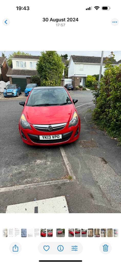 Red vauxhall corsa 