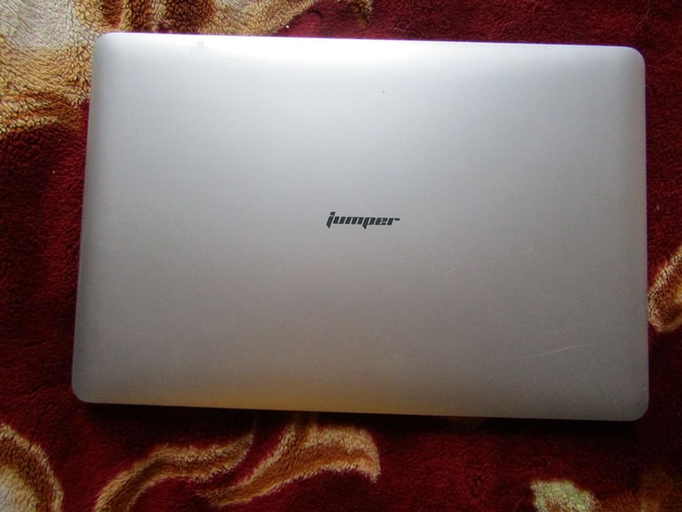 silver JOOMPER 14inch laptop tools in good condition lightly used 64GB own charger