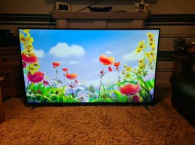 TV 65INCH HITACHI SMART WIFI 4K ULTRA HD HDR IN VERY GOOD CONDITION 