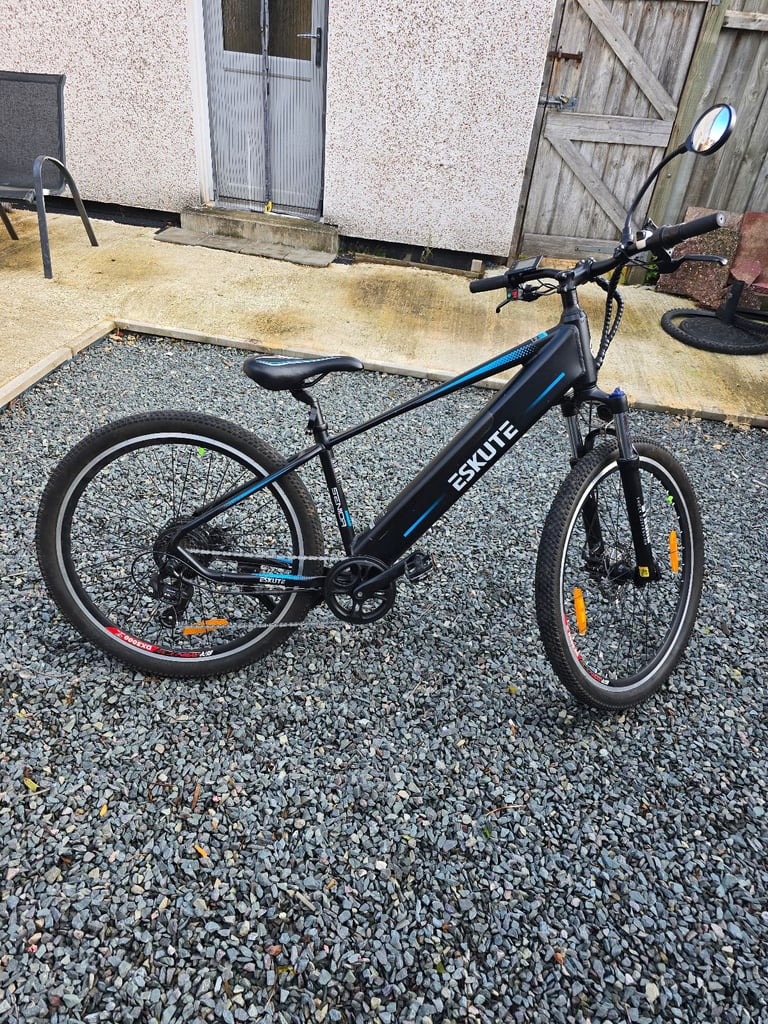 Eskute electric bike with throttle aswell as peddle assist road legal 15mph
