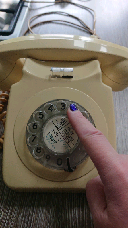 Old style rotary dial telephone. 