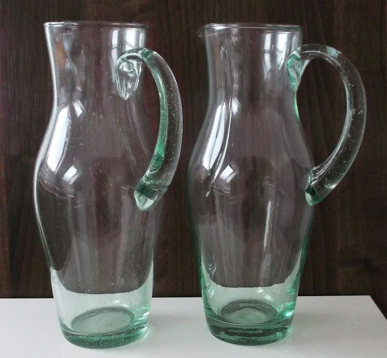 image for Pair of NEW Green Tinged Tall Glass Juice/Water Jugs