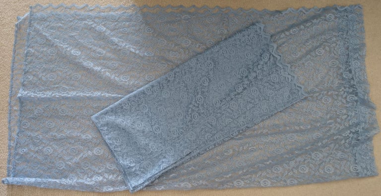 Pair of lace net curtains, in mid blue or French blue