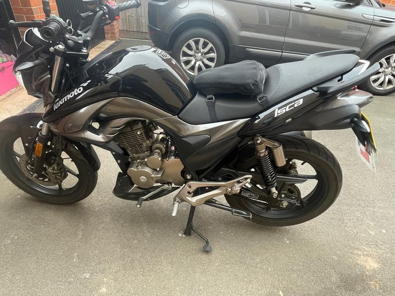 Lexmoto, ISCA, 2024, 124 (cc)