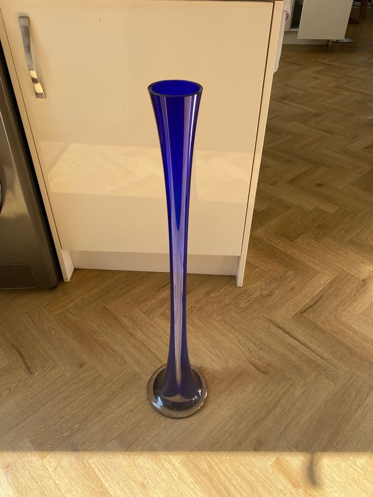 Blue glass tall vase. 