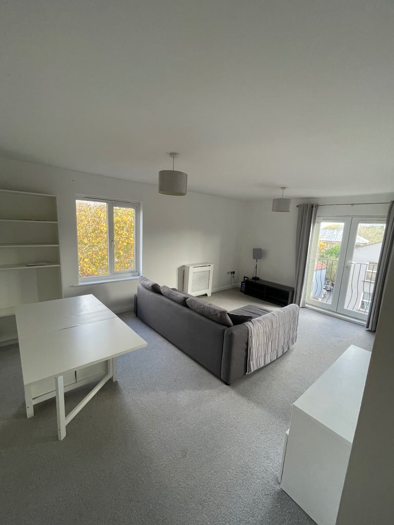 Top floor 2 beds flat with secure parking