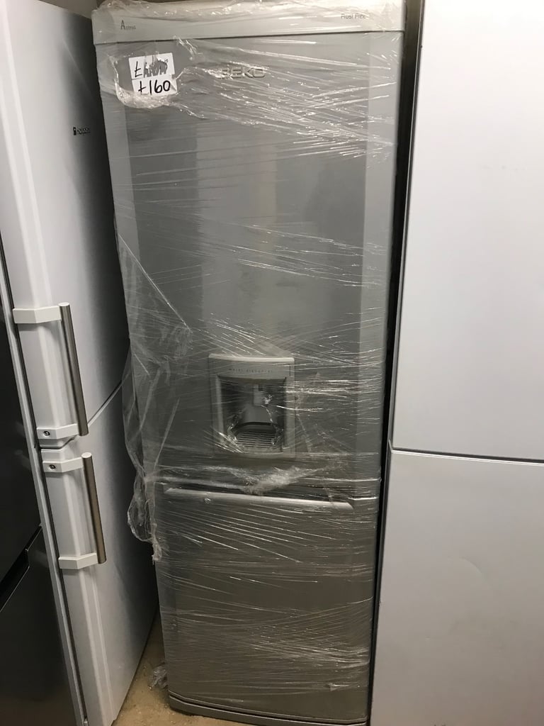 image for BEKO FRIDGE FREEZER WITH WATER DISPENSER LIKE NEW £160