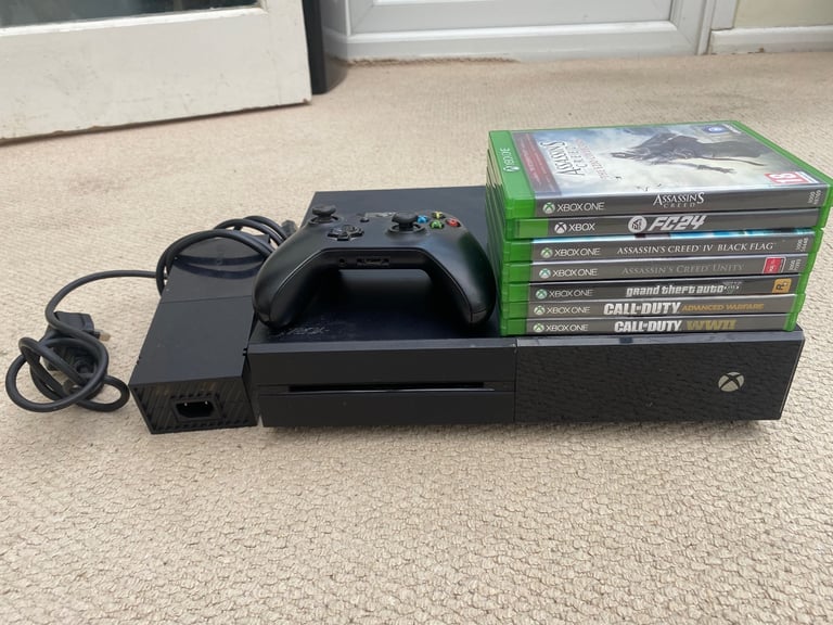 image for Xbox one with controller and games