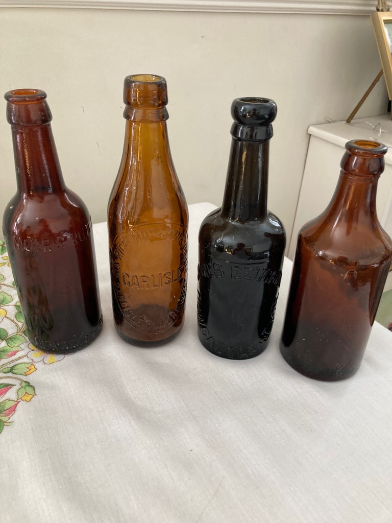 image for Four brewery bottles 