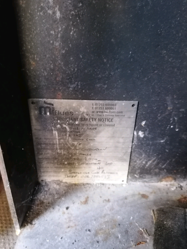 Wood log burner with storage underneath