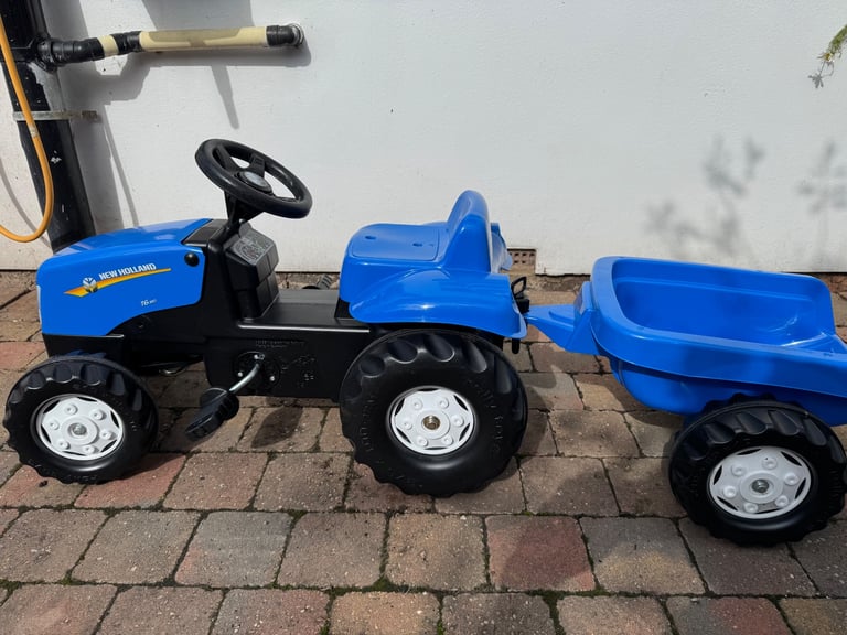 New Holland tractor and trailer 