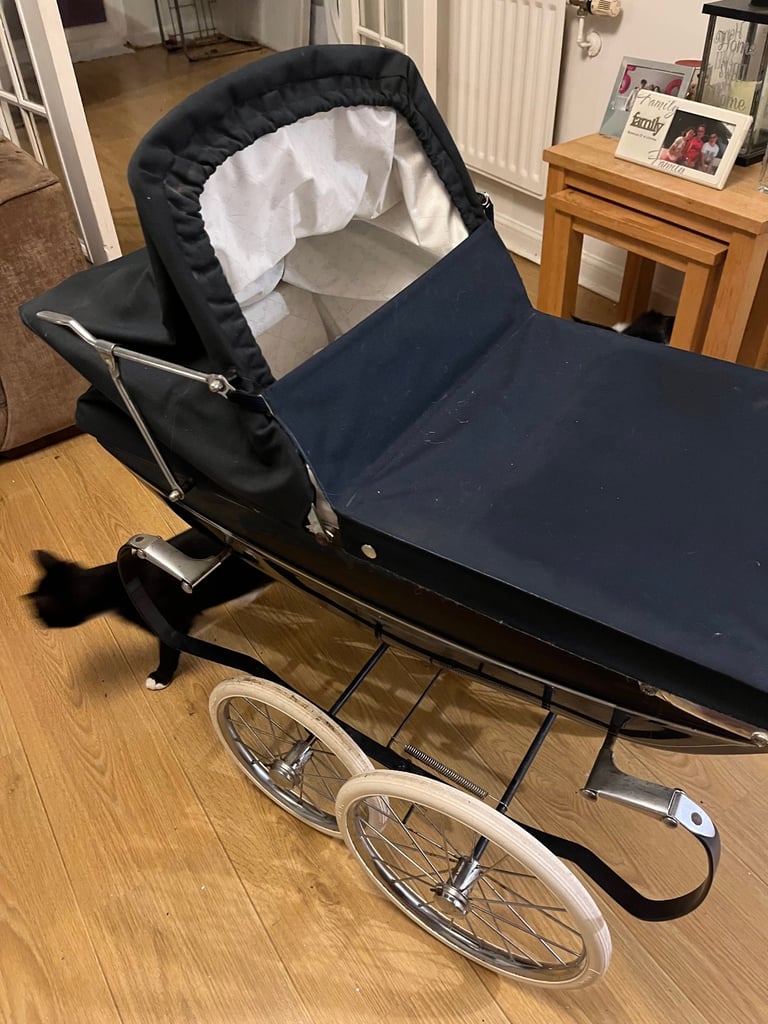 Children’s silver cross pram