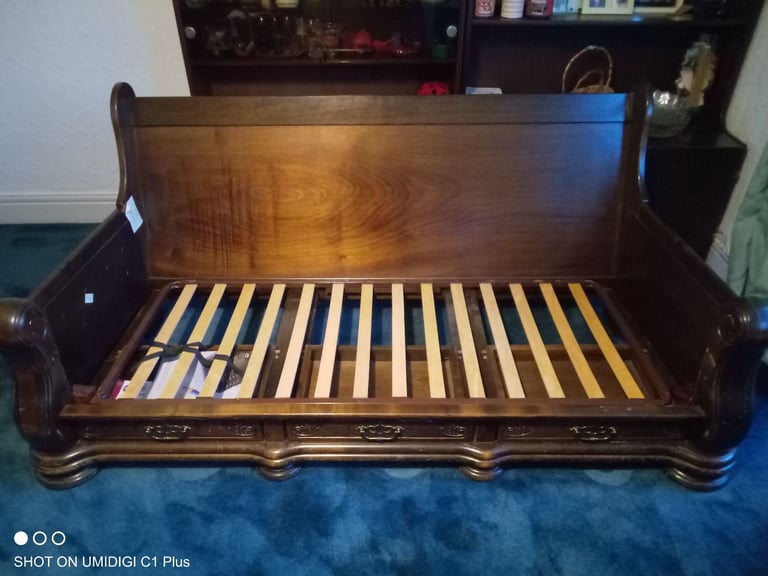 3 seater, 3 drawer sofa wood frame for sale.