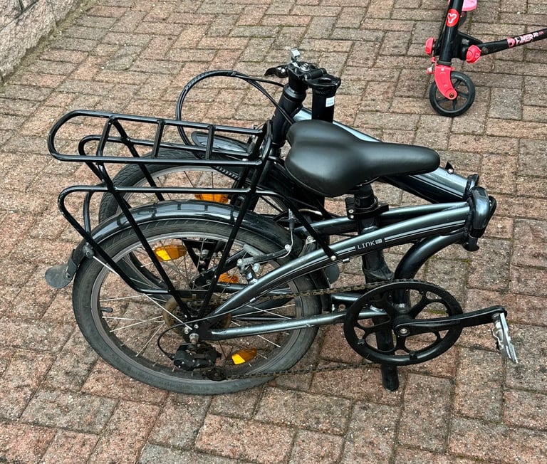 Tern folding bicycle with frame and pannier