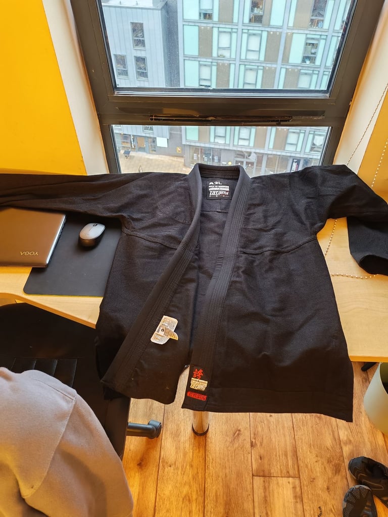 Tatami™  bjj gi with white belt, size A2L, used less than a week.  