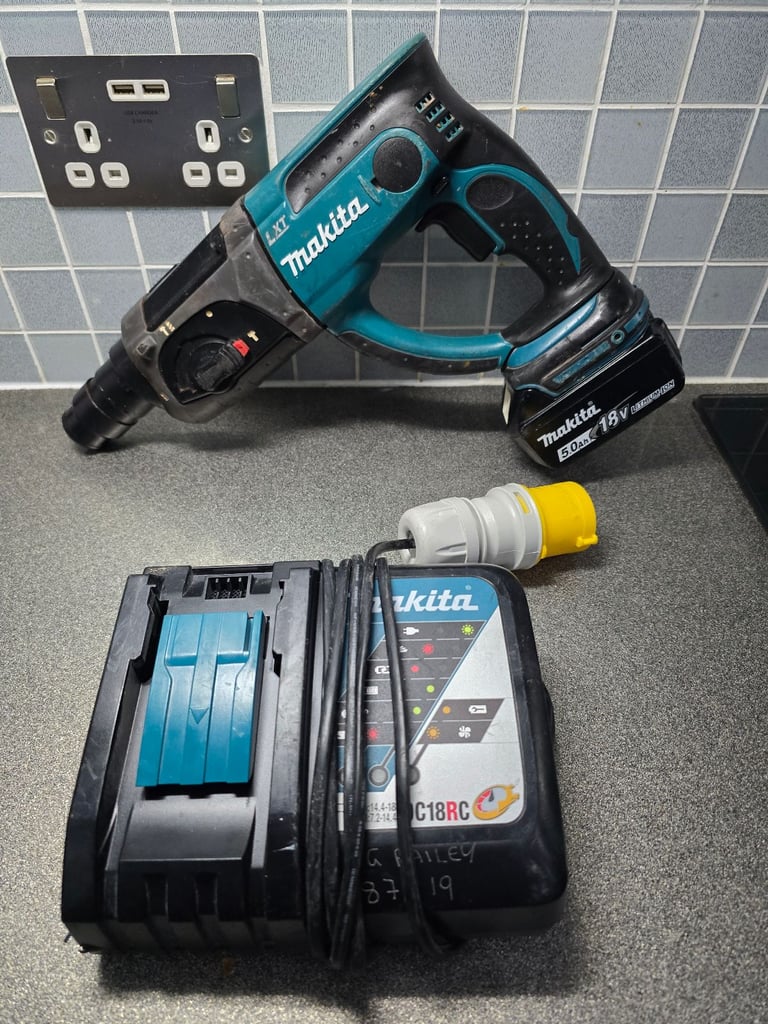 image for Makita sds , 5ah battery and 110v charger 