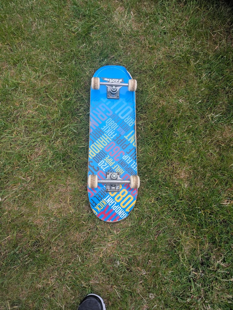 Skateboard with Knee and Elbow Pads 