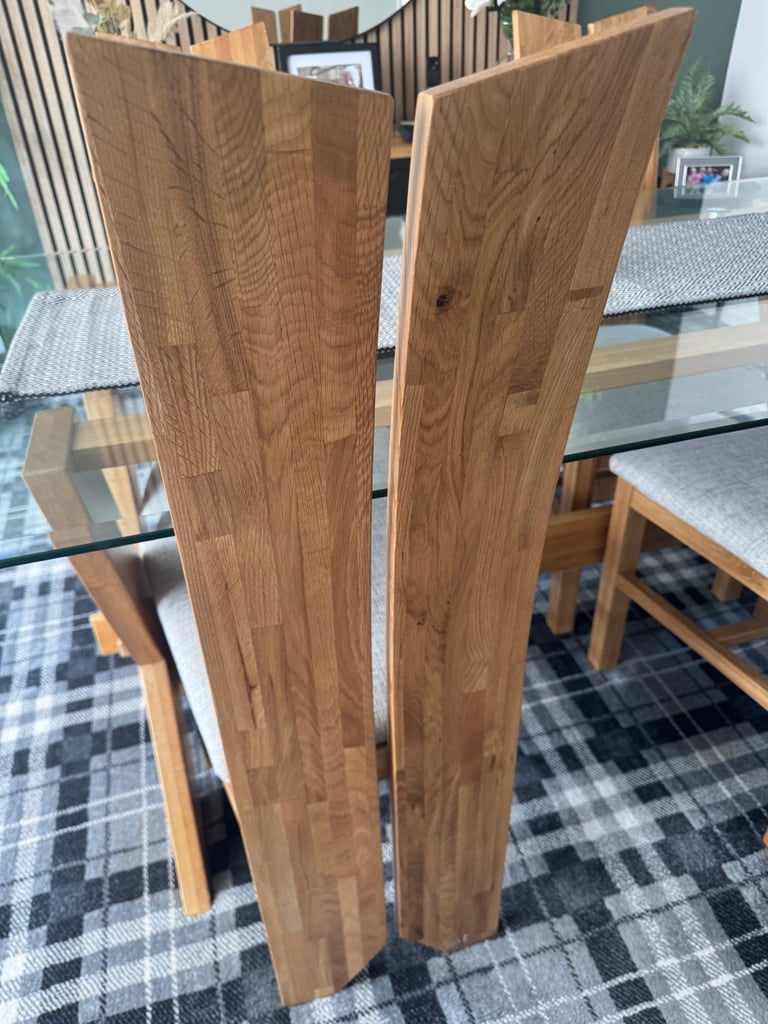 Glass dining table and four chairs