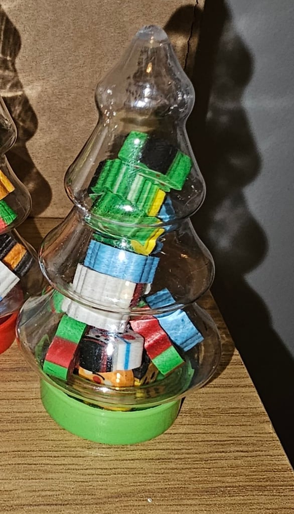 Mini novelty Christmas rubbers/erasers in a Christmas tree tub £2 each