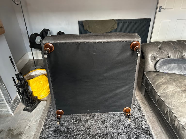 Grey leather chesterfield footstool