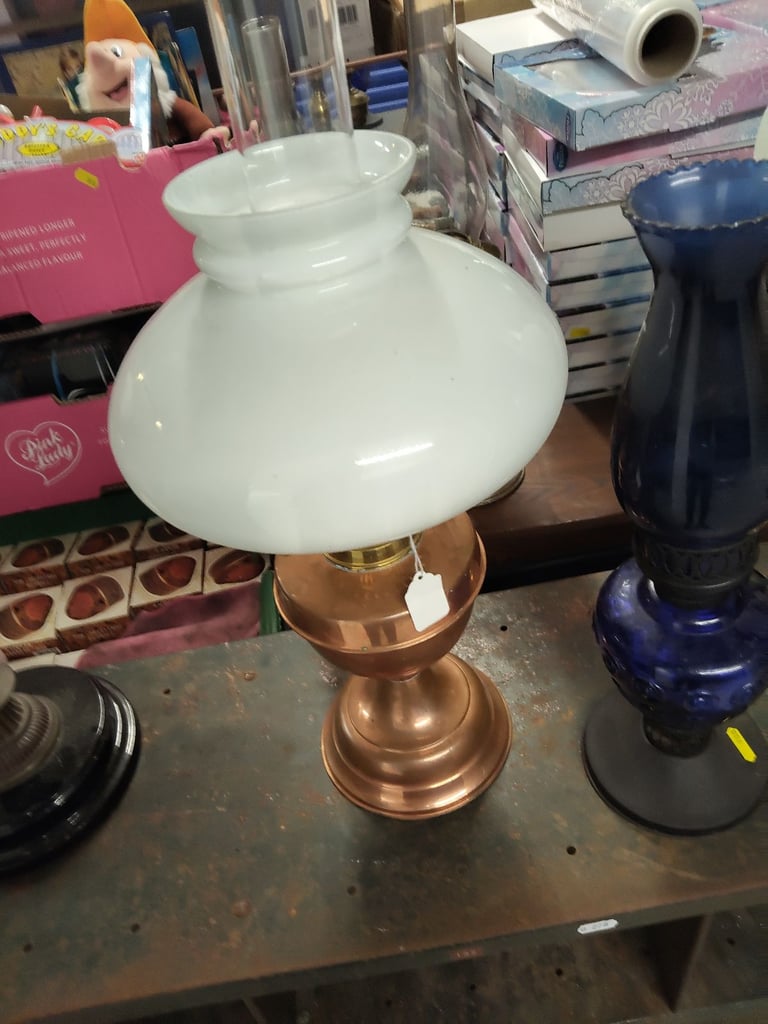 A group of 5 oil lamps 