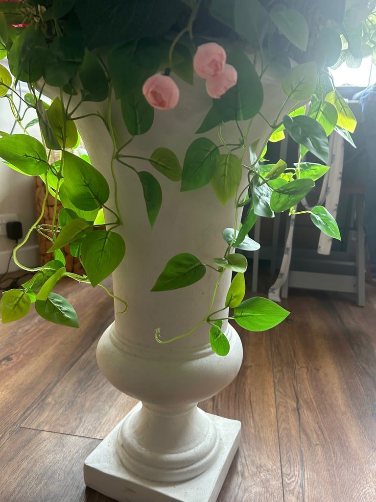 Artificial Flower Arrangement in stone pillar vase