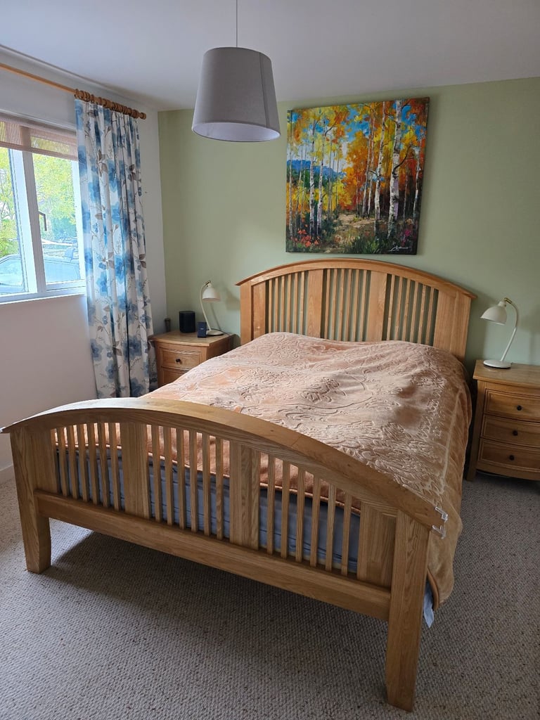 image for Solid oak kingsize bed and pair of matching bedside cabinets