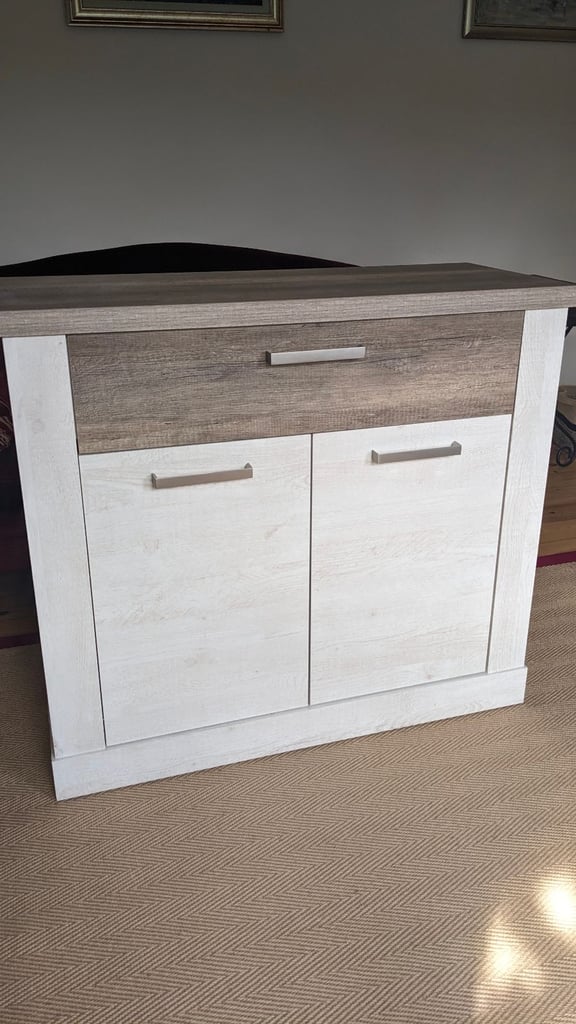 Sideboard with a drawer and one shelf.