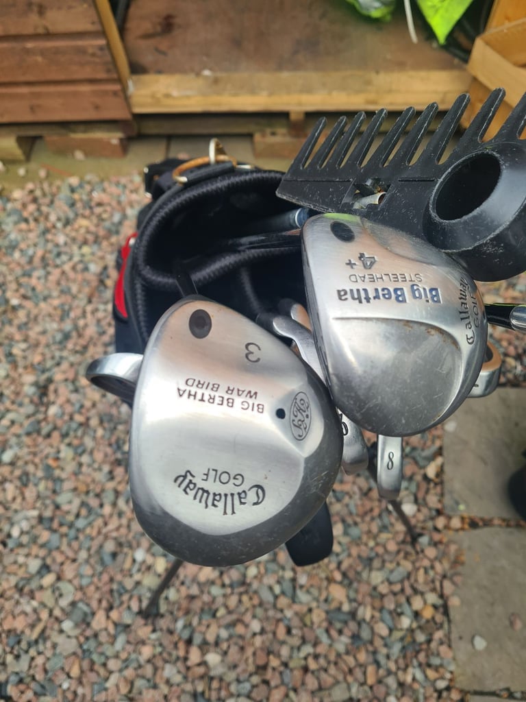 Full set of golf clubs.