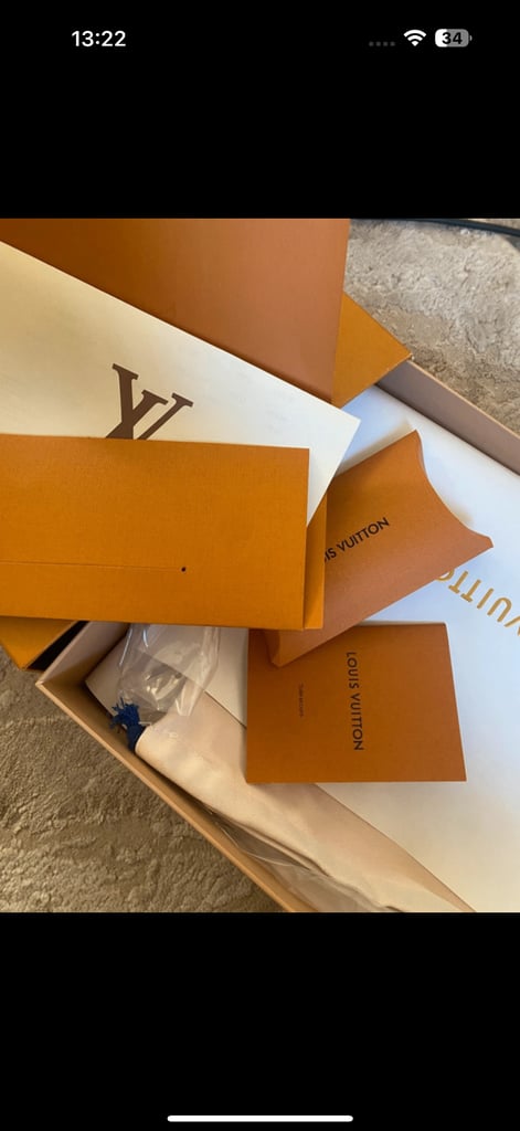 Black and white Louis Vuitton trainers 