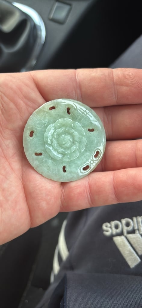 Hand carved jadeite pendant. Jadeite is one of two minerals that are known as jade, or nephrite. 