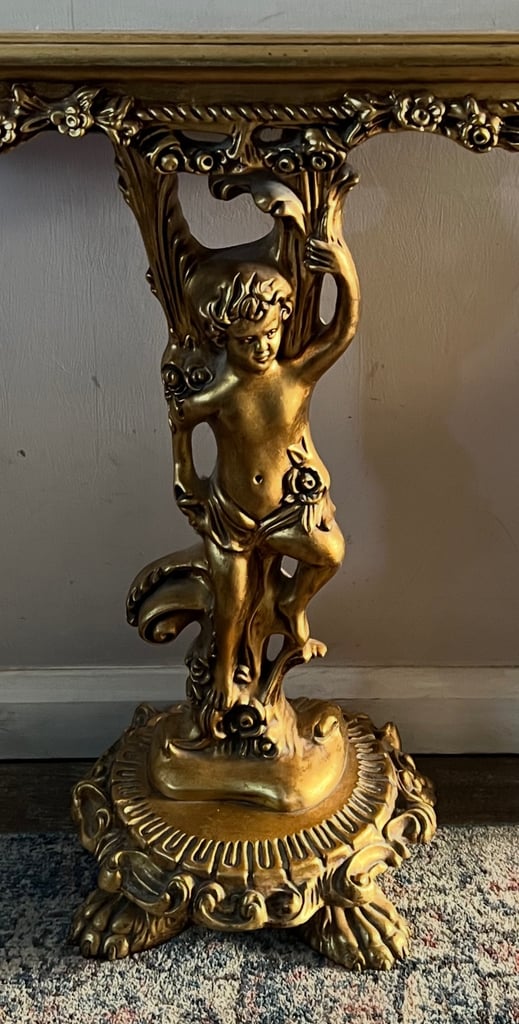 Lovely ornate cherub console table
