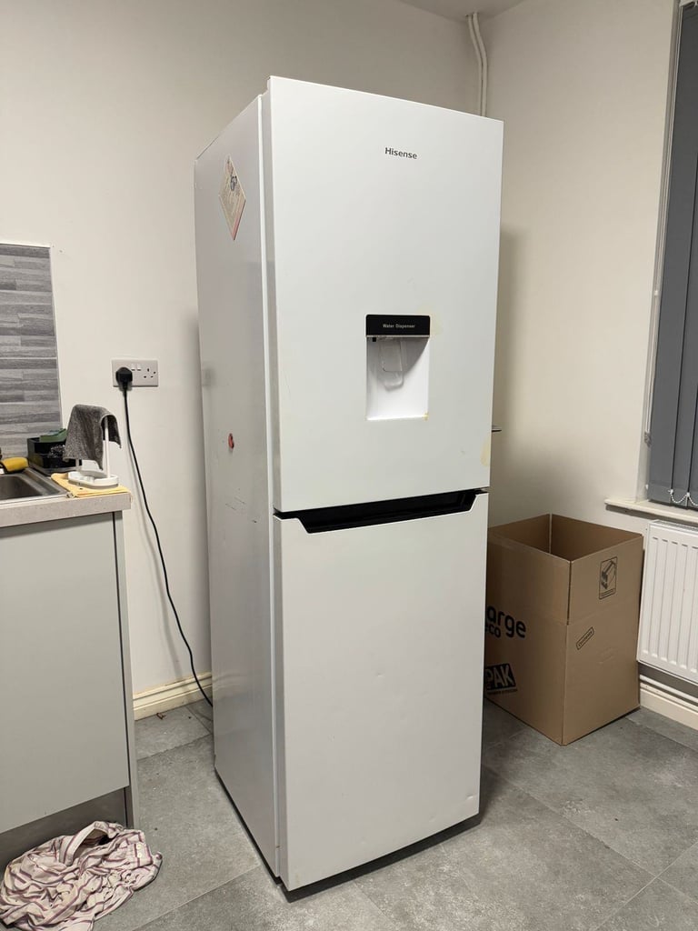 Hisense fridge freezer with water dispenser.