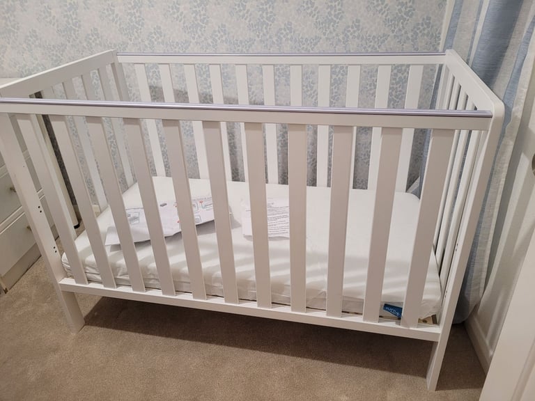Hardly used Adjustable Cot/bed with Mattress 120 x 60cm