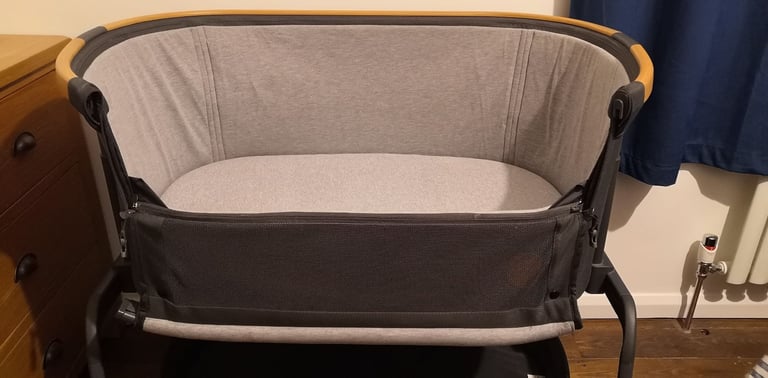 Maxi Cosi Iora next to me cot