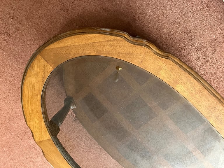 OVAL WALNUT COFFEE TABLE WITH GLASS TOP