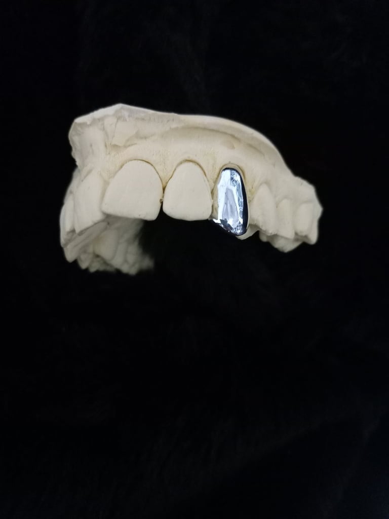 Custom made solod cap single tooth grillz