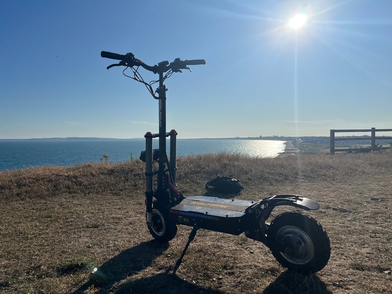 Wolf H9 Atv all terrain military grade 5200 watt e scooter 2 wheel drive 62 volt 60 mph