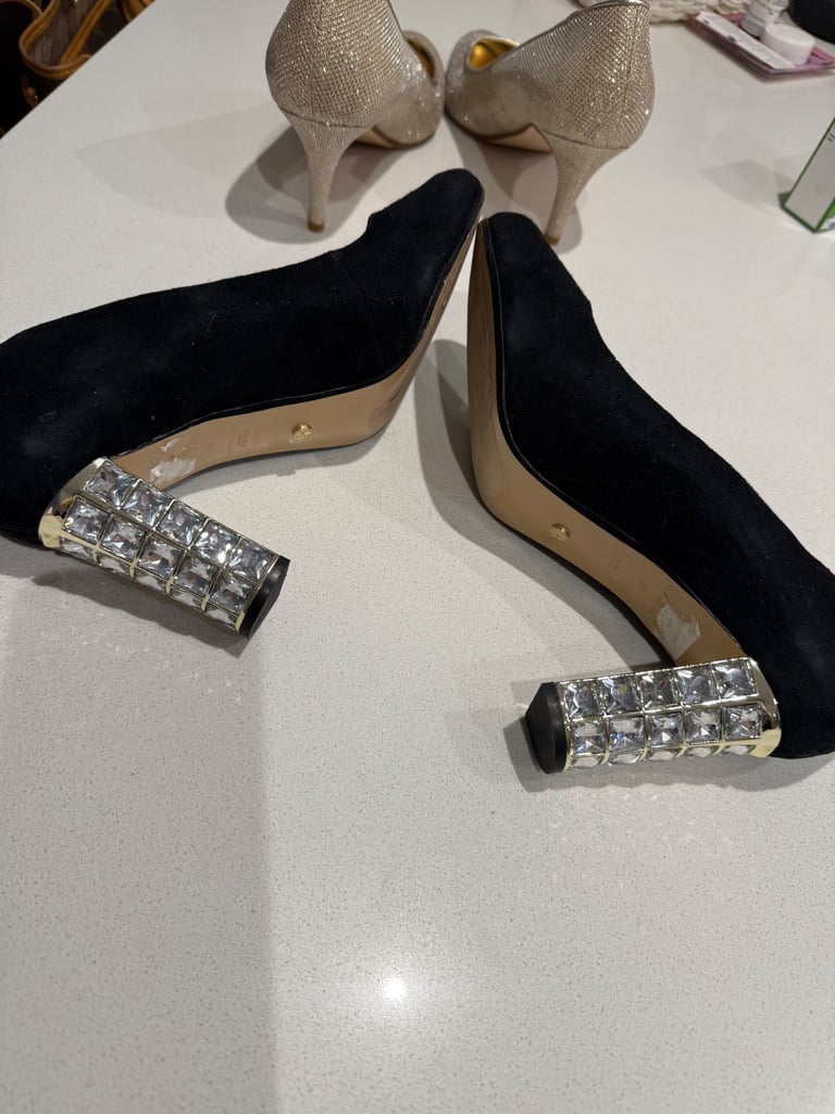 Black suede shoes with a glitter heel 