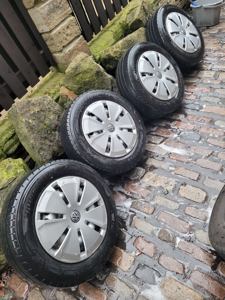 These 4 Vw Transporter T5 T6 wheels come with genuine Vw wheel trims