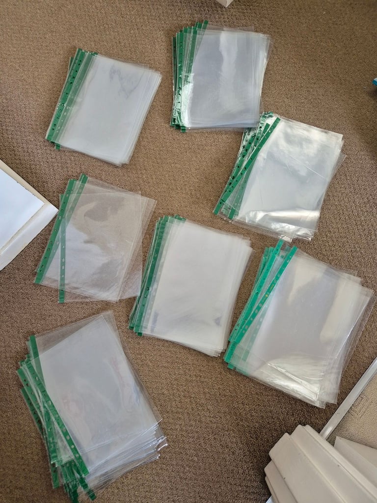 image for Nearly 200 Quality A4 Punched Pockets - most of them never used