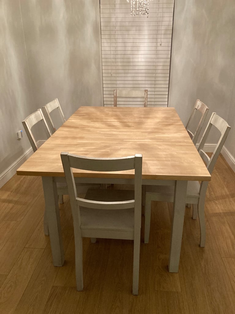 image for IKEA extendable solid wood dining table with 6 chairs 