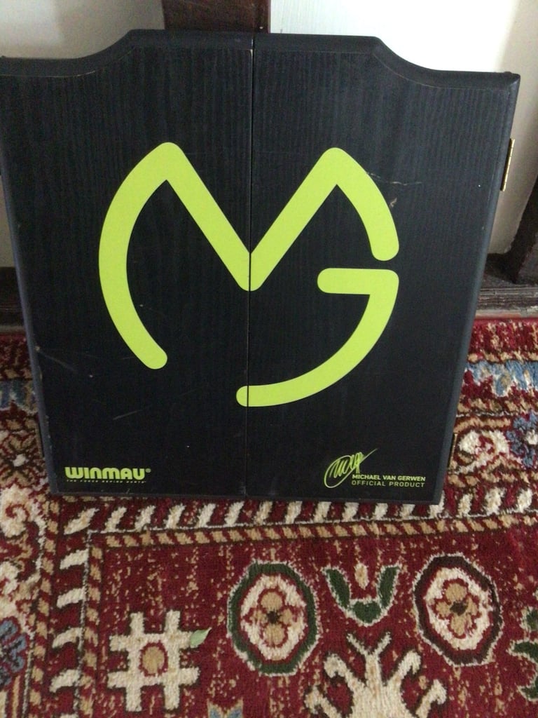 Winmau dartboard in cabinet 