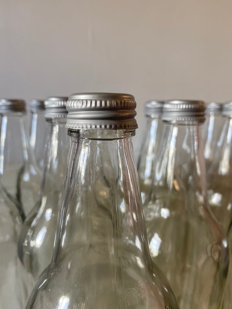 Empty glass bottles set of 18