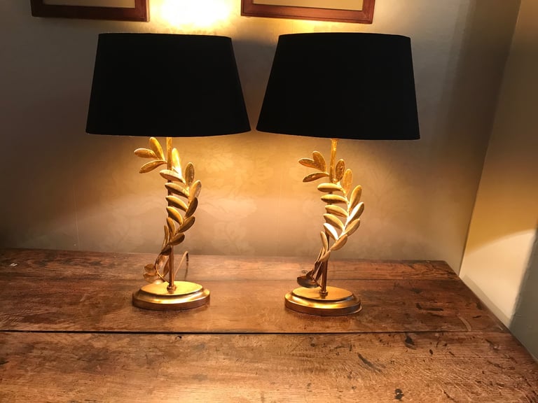 Pair of Laura Ashley side lamps gold with black shades. 