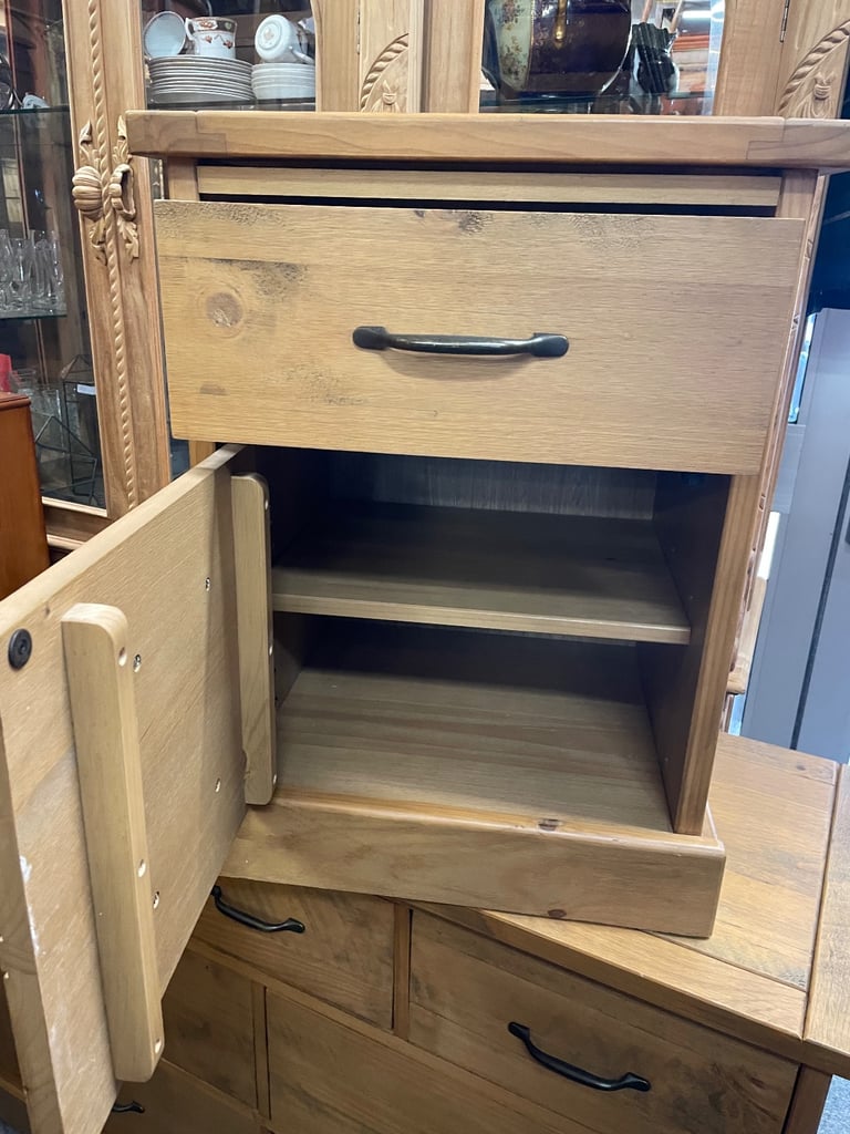 Two, solid wood bedside cabinets.