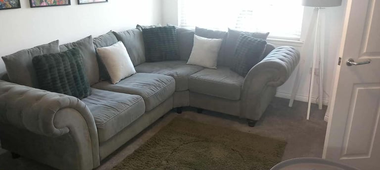 Corner suite with armchair and pouffe