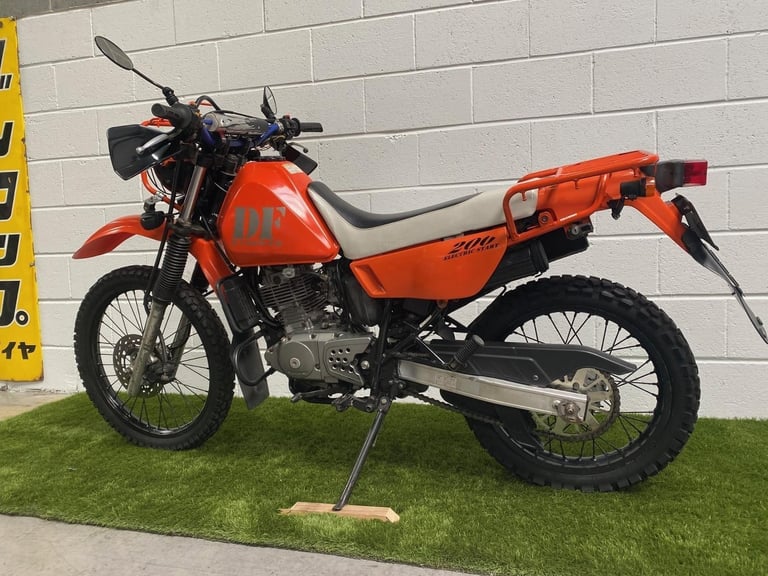 1998 JDM Suzuki DF200E enduro with large rack and headlight guard